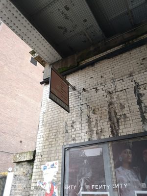 Outside sign under the bridge at Where The Pancakes Are in South East London