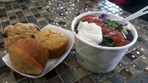 No coast bowl, vegan muffins & vegan chocolate chip cookie in compostable packaging at The Full Bowl in Cedar Rapids