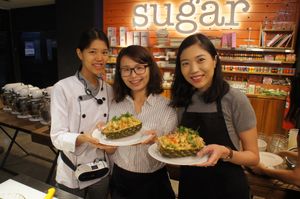 Happy participants who made their own raw vegan pineapple fried rice. at Raw Vegan Workshop - Eating Thai & Spice of India in Kuala Lumpur