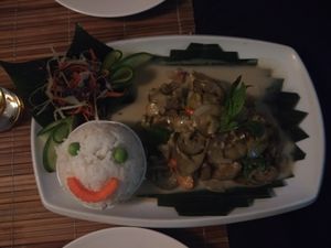 Fried aubergine in coconut with happy face rice! at Bamboo Tree Lao Cooking School and Restaurant in Luang Prabang