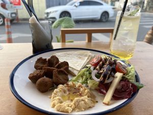 Delicious Vegan meal. It was their falafel plate with bread, salad, hummus and falafel. Everything was tasty and went well together. Their lemonade was the best I have had yet!  at Cafe Vege Bakery in Gyeongju