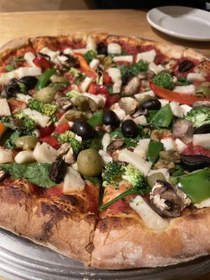 Vegan pizza with cheese we brought in    at Horn O Plenty in Bedford