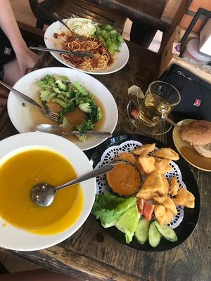 All vegan - pumpkin soup, deep fried tofu with peanut sauce, broccoli & garlic, tomato pasta  at Blue Diamond in Chiang Mai