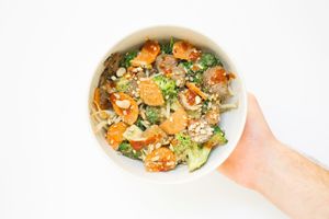 THE CRUNCHY CRAVE: Creamy Cashew, spiced medium, brown rice, grass-fed steak, bean sprouts, kale, broccoli, carrots  at Brightwok Kitchen - The Loop in Chicago