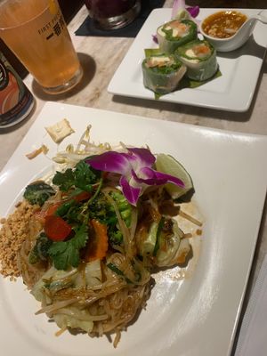 happy hr spring rolls and pad thai they can make vegan  at Noi Thai in Honolulu
