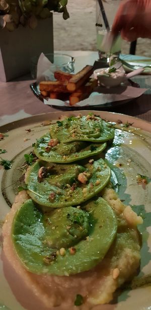 Ravioli with vegan cream and chives  at Mandala in Belgrade