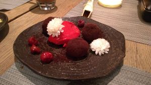 Chocolate truffles with fresh elderberry ice cream at Mandala in Belgrade