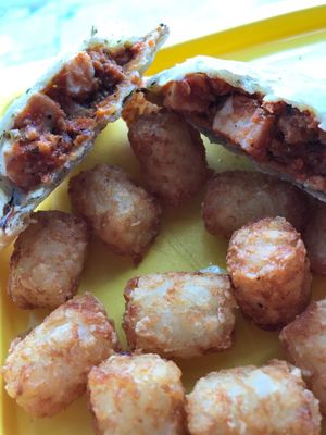 Inside kids pizza pocket with tater tots at Morels Cafe in Louisville