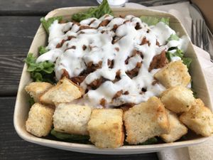 Buffalo Chicken Ranch Salad - a bit oily but besides that nice and spicy at Morels Cafe in Louisville