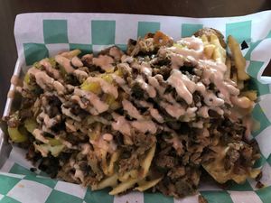 Philadelphia cheese steak n waffel fries at Morels Cafe in Louisville