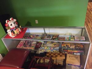 Board games and card games available to play. at Cafe Boba in Kentwood