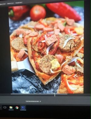 Pizza with "ham", "chorizo" and "mozzarella" plus some veggies.  at Fratello Vegan in Cuenca