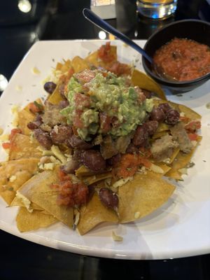 Nachos de la casa con salsa picante  at Fratello Vegan in Cuenca