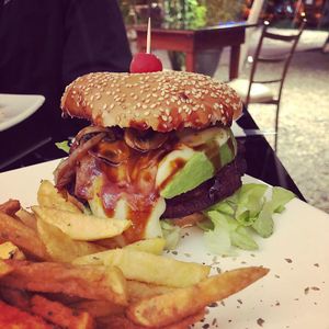 Burger with mushrooms avocado and melted vegan cheese :) at Fratello Vegan in Cuenca