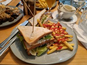Club sandwich with pepper chips at Beans&more in Jyvaskyla