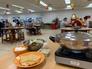 Steamboat and photo of restaurant in temple. Photo by Henry Lau aka Mr Purple. at Kong Meng San Phor Kark See Monastery in Central Singapore