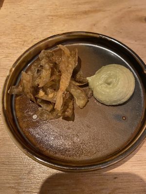Fried and fermented potato skins: very good  at Morris and Bella in Amsterdam