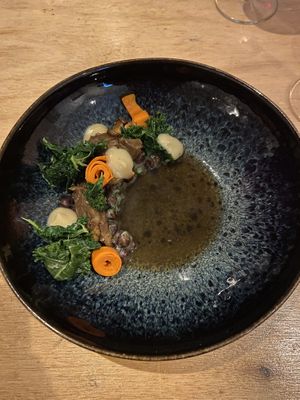 Intermediate course with kale, carrot, shiitake and dashi  at Morris and Bella in Amsterdam