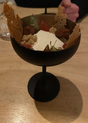 Intermediate dish with salty Max & Bien cheese and rhubarb  at Morris and Bella in Amsterdam