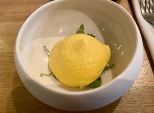 Amuse: endive with sea buckthorn mousse. Fresh taste  at Morris and Bella in Amsterdam