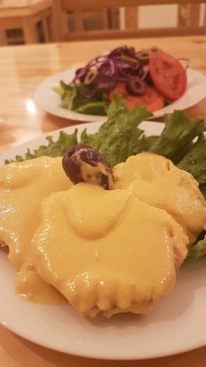 Bomb potatoes with a cream sauce at Abdiel Vegan in Lima