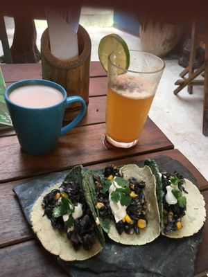 Huitlachoche tacos and this cacao, reishi, chaga brew with homemade coconut milk is divine! at Raw Love - Downtown Tulum in Tulum