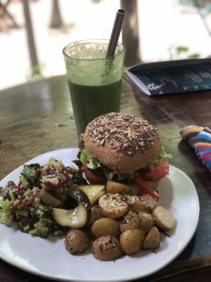 Vegan burger with green goddess.  at Raw Love - Downtown Tulum in Tulum