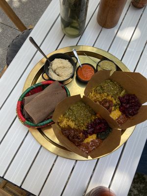Mixed selection of curries lunch box  at Beza Ethiopian Food in South East London