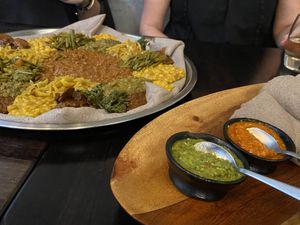 Misir wot, difin misir wot, kik wot, Tikal gomen, string beans and carrot, mushroom, scrambled chickpeas, carrot stew, injera.  at Beza Ethiopian Food in South East London