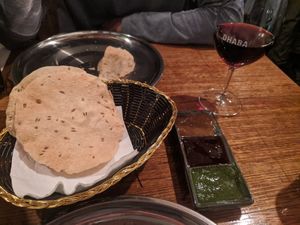 Vegan sangiovese with pappadums and chutney. at Dhaba in Kyneton