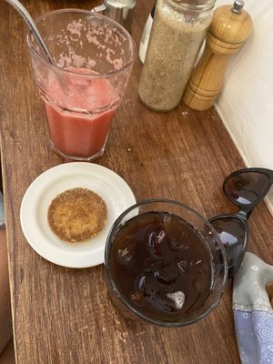 Oat cookie, cold coffee and juice!   at El Cafe in Havana