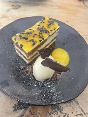 Passionate fruit and almond cake with chocolate sponge and a mango coulis  at Cradle in Sudbury