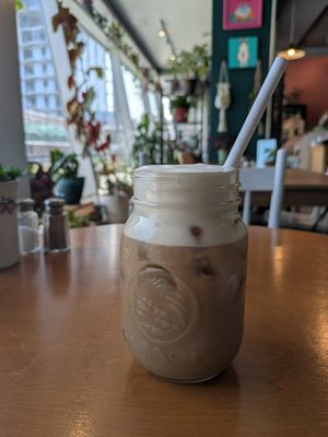 Iced coffee with Carmel cold foam at Springhouse in Halifax