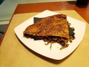 Greek pie filled with kale, kidney beans and herbs. at Healthy Bites in Athens