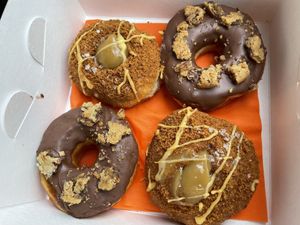 @yesdoughnuts milk n’ cookies and salted caramel biscoff bomb  at GRUB in Manchester