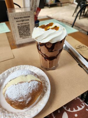 chocolate milkshake and cream filled donut at Padoca Vegan in Sao Paulo