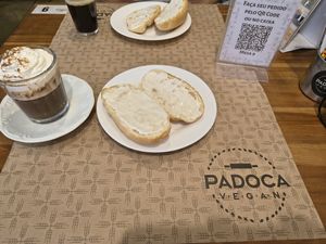 Pão na chapa com requeijão e capuccino com chantilly at Padoca Vegan in Sao Paulo