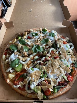 Half half family pizza with vegan nacho and vegan satay at Riptide Pizza in Woolgoolga