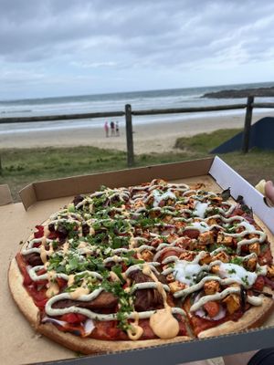 The Lookout points to the beach are beautiful places to eat the take-away pizza. There are lots of picnic areas. We had 1/2 Jackfruit-Barbecue and 1/2 Tandoori-Tofu.  at Riptide Pizza in Woolgoolga