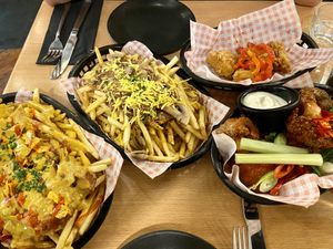 Vegan poutine, 4/20 fries, cauliflower wings and jackfruit nuggets at Down the Hatch in Liverpool