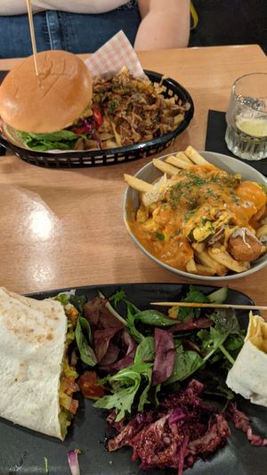 Katsu burger and wrap with currywurst chips at Down the Hatch in Liverpool
