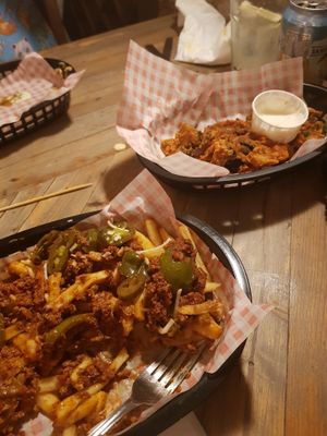 Battered garlic mushrooms and vegan chilli loaded fries. at Down the Hatch in Liverpool