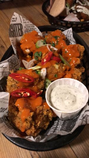 Cauliflower wings with buffalo sauce  at Down the Hatch in Liverpool