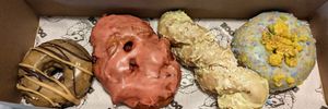 Cookie Butter Cup, Strawberry Rhubarb Fritter, Lime Coconut Twist, Birthday Cake at Doe Donuts in Portland