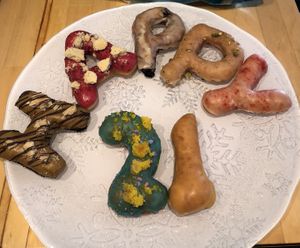  H - millionaire’s shortbread A - BBue raspberry poptart P - blueberry pancake old fashioned P - almond pistachio baklava Y - pink lemonade 2 - birthday cake 1 - vanilla bean  at Doe Donuts in Portland