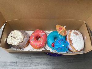 Left to Right: Portland Fog, Doe, Blue Hawaiian, and Ube Cream Puff  at Doe Donuts in Portland