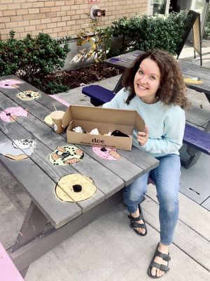 Very happy about the delicious donuts I was about to indulge in  at Doe Donuts in Portland