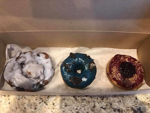 Blueberry lavender fritter, cookies & cream, and marionberry! at Doe Donuts in Portland