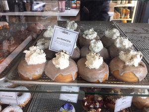 The super yummy Portland Fog, the whipped cream isn't too sweet and compliments the Earl Gray glaze perfectly. at Doe Donuts in Portland