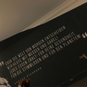 “Today we decide on the world of tomorrow with knife and fork! Every meal counts: for your health, for the voiceless and for the planet!” at Attila Hildmann Organic Snackbar I in Berlin